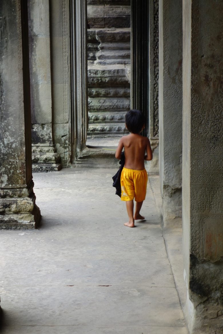 Boy Angkor temple