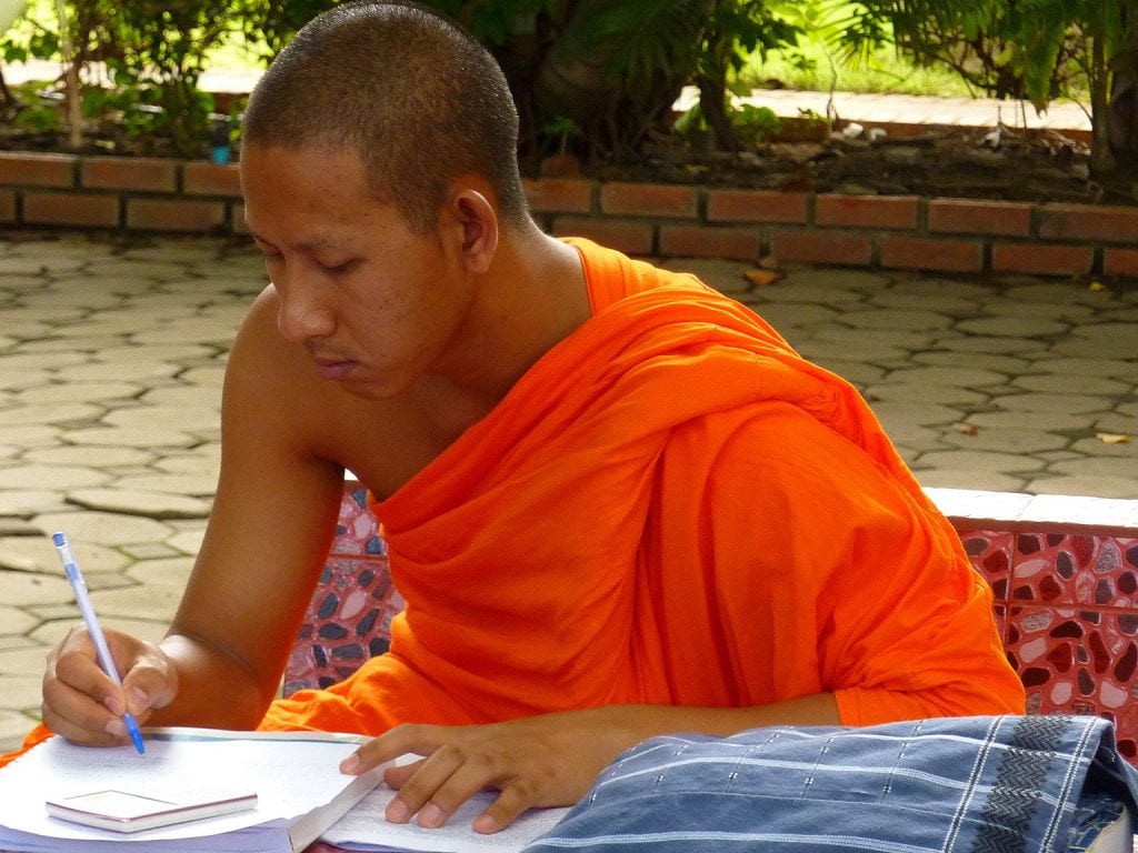 Monk writing book