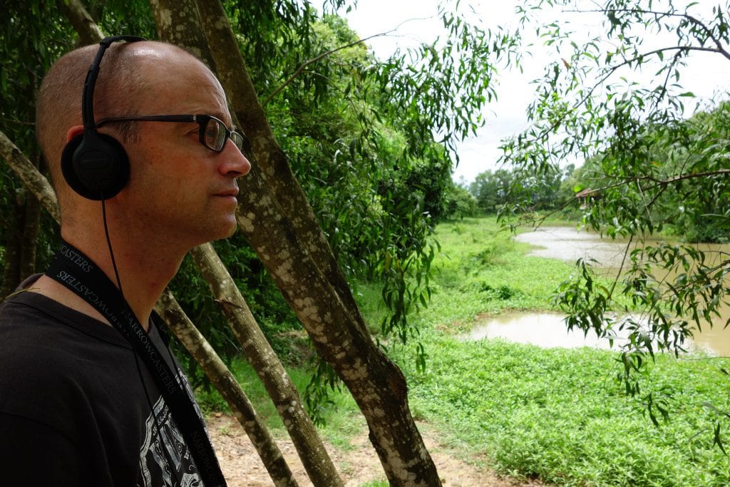 Listening to Audio tour Killing Fields