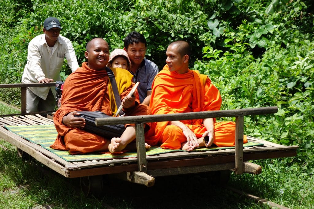 Monks on Bamboo train