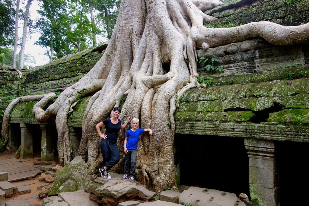 Our family in front of giant tree on temple