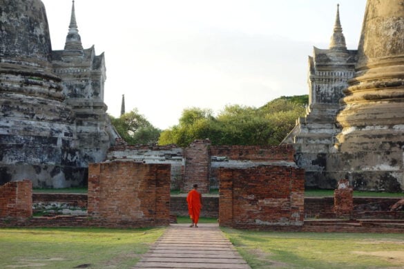 Thai Monk walking towards temple